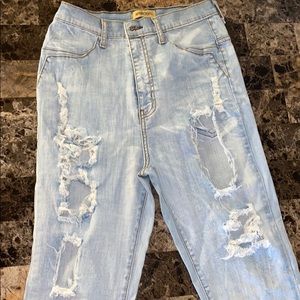 High waisted, ripped jeans